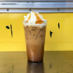 Mocha Specialty Coffee with whip cream and caramel sauce